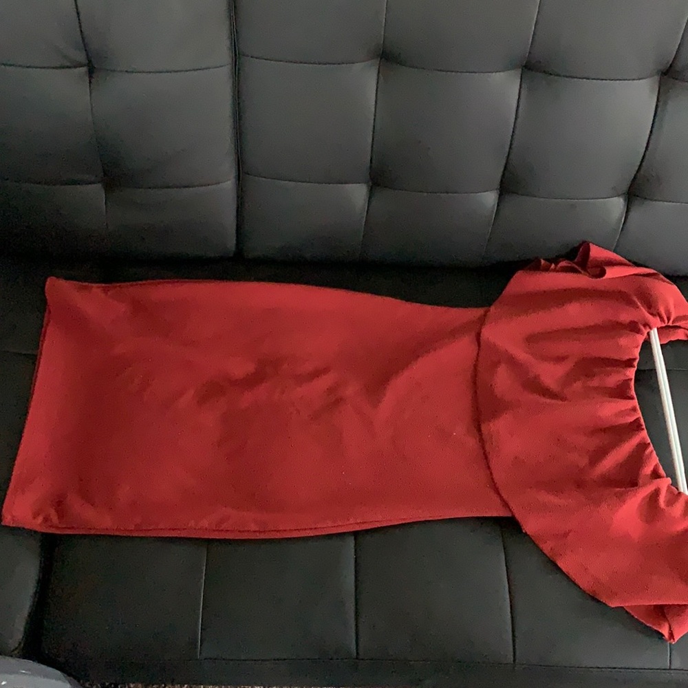 It’s a paprika color it is fits a little snug.